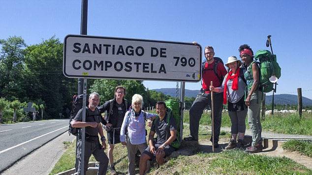 The Pilgrimage Group photo at Santiago de Compostela sign