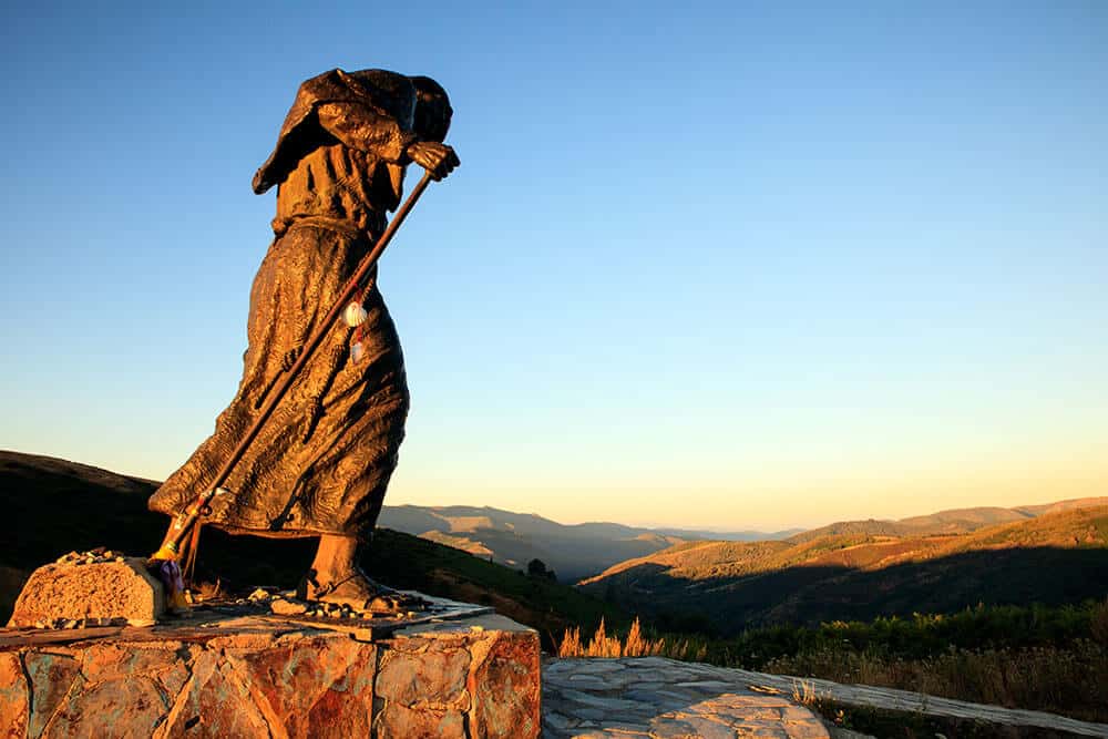 Statue of the Pilgrim walking the camino Camino routes landscape