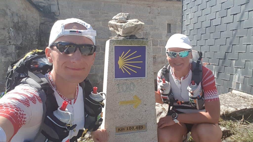 Pilgrims-beside-the-scallop-shell-Camino-de-Santiago