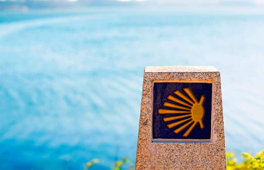 Milestone with the scallop shell, one of the main Camino de Santiago symbols