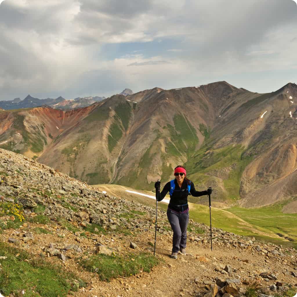 Girl walking up mountain