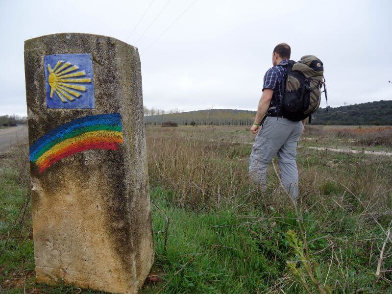 pilgrim camino marker rainbow