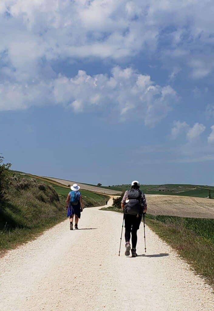 a pilgrims walking on a path