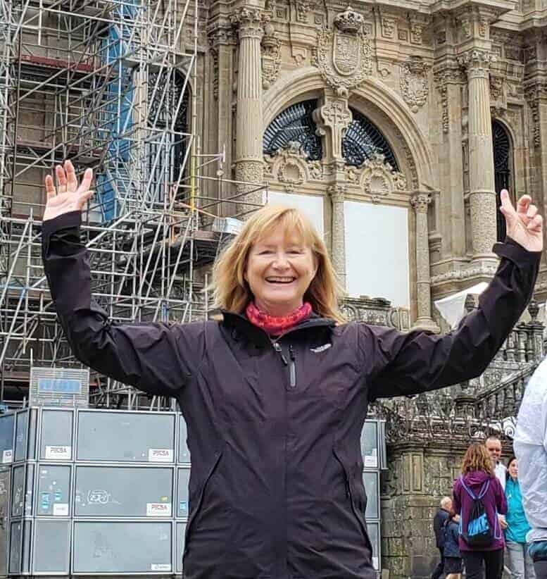 a picture of a pilgrim in front of a cathedral