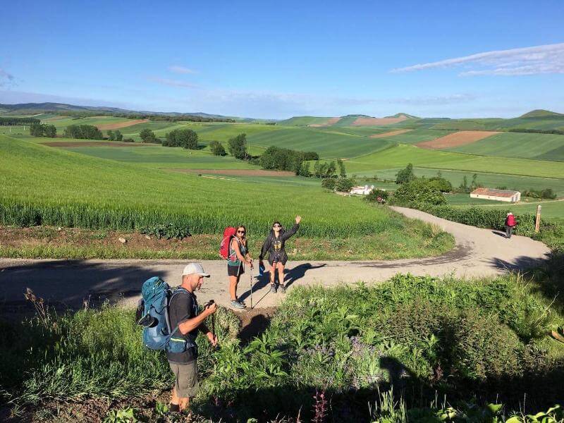 a picture of a group of pilgrims on a path