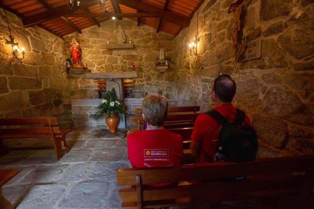 Pilgrims in a church on the Camino religion