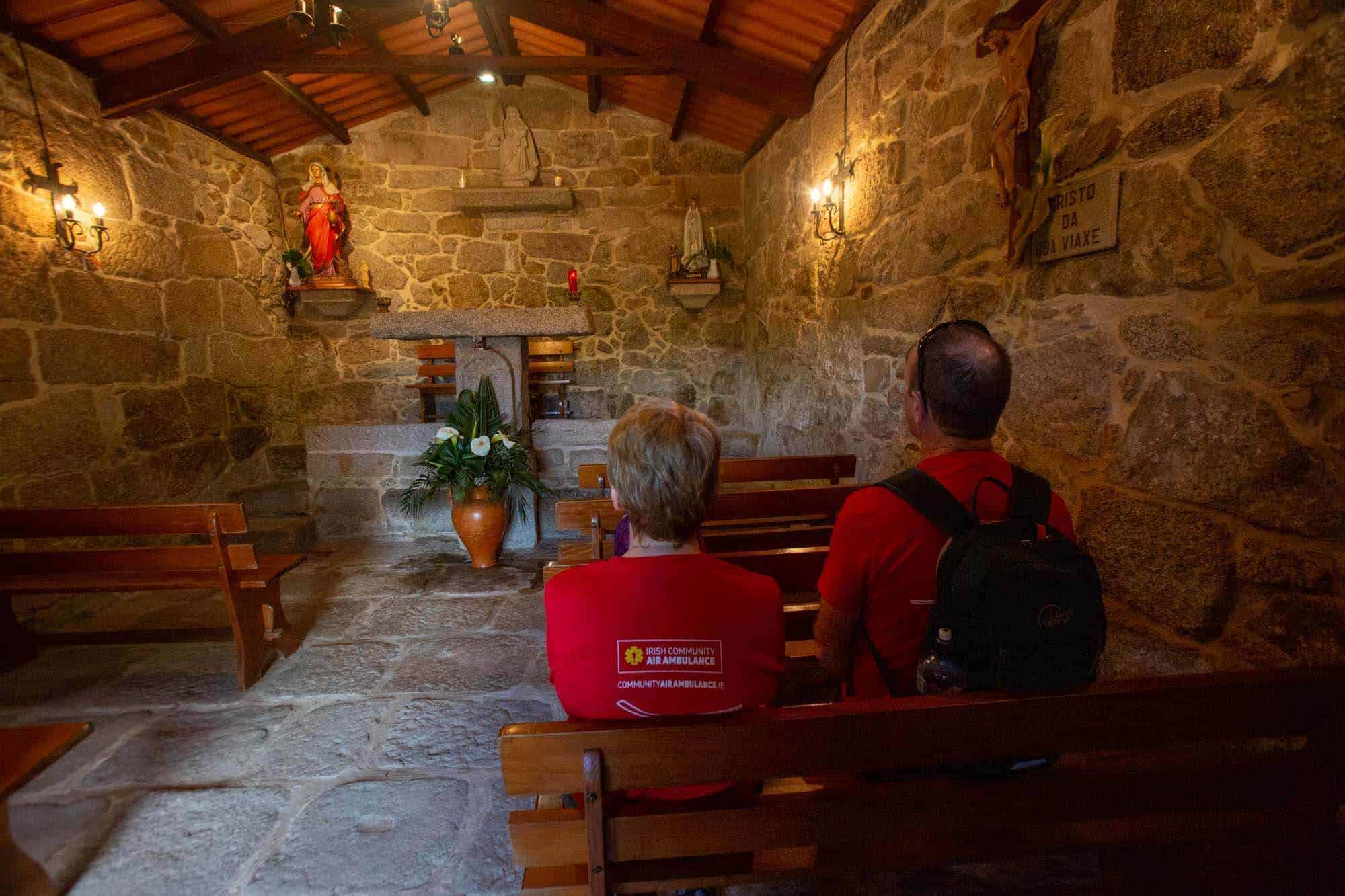Pilgrims in a church on the Camino religion