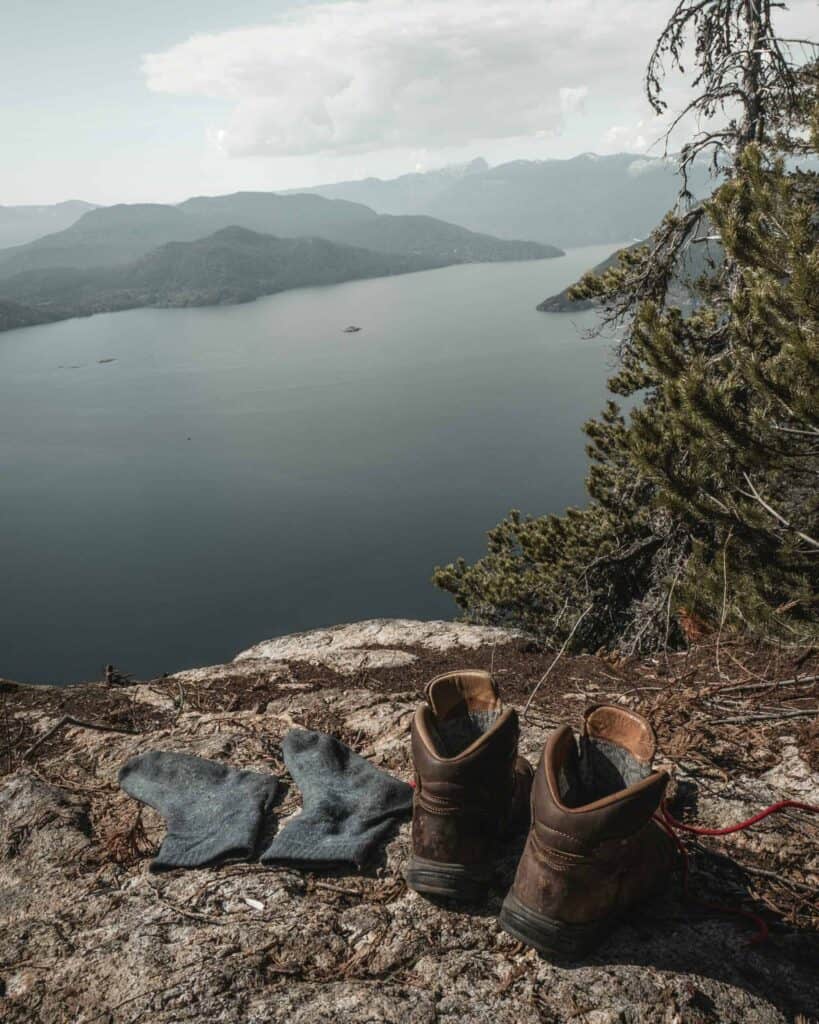 socks and boots for camino on a cliff