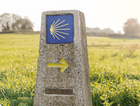 Camino de Invierno milestone yellow arrow camino de santiago