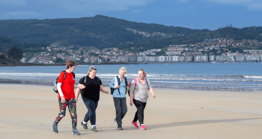 Group Walking on the Beach