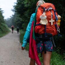 Pilgrim walking with bag pack