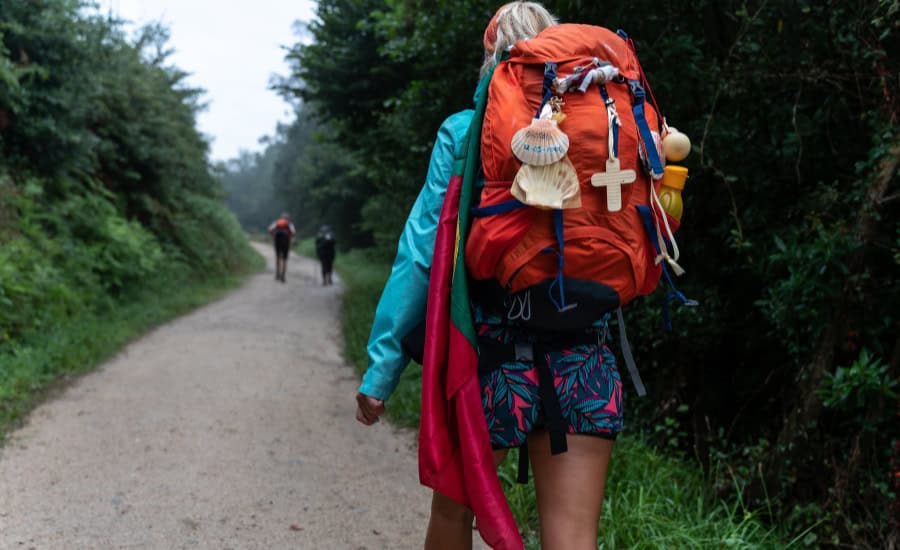 Pilgrim walking with bag pack