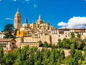 Leon city with old buildings and architecture surrounded bu trees