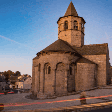 historic stone church with bell tower