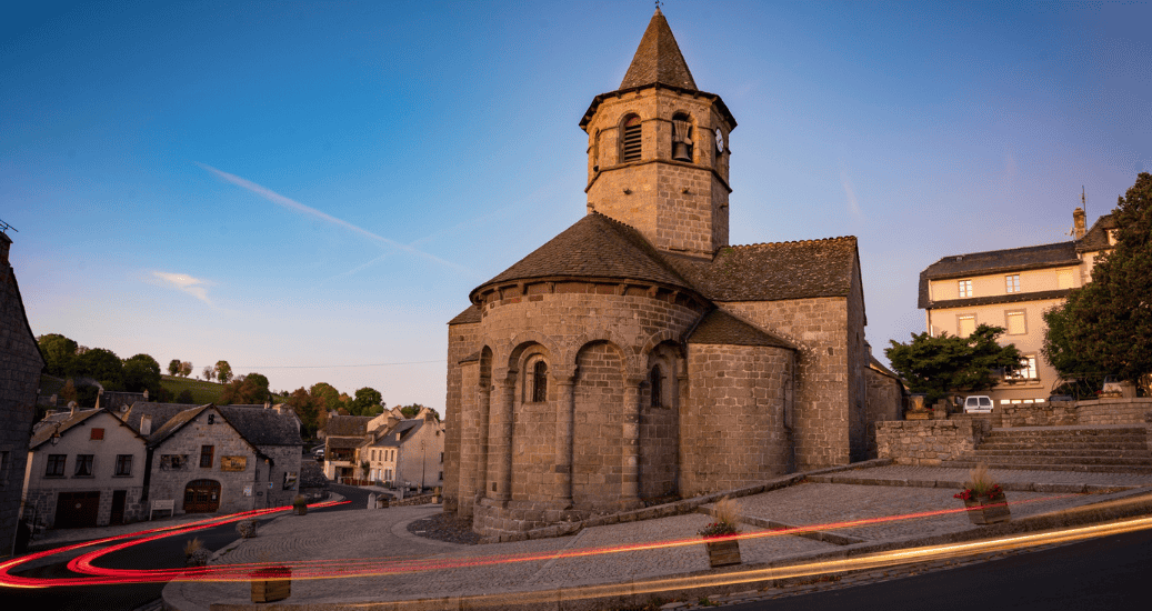 historic stone church with bell tower