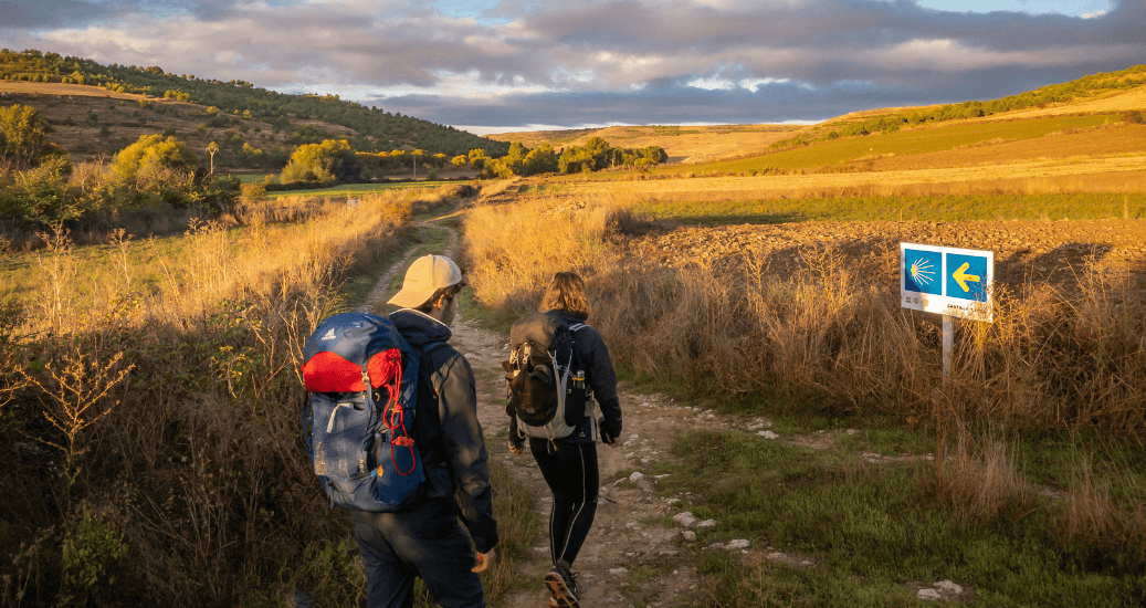 Couple walking on Camino path