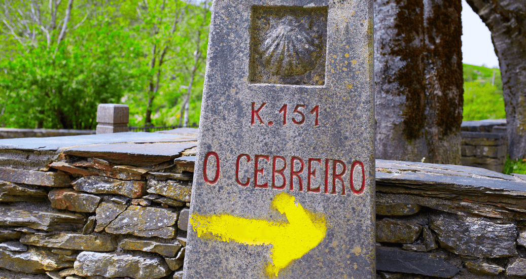 O CEBREIRO yellow arrow sign