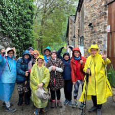 Guided group on camino in ponchos
