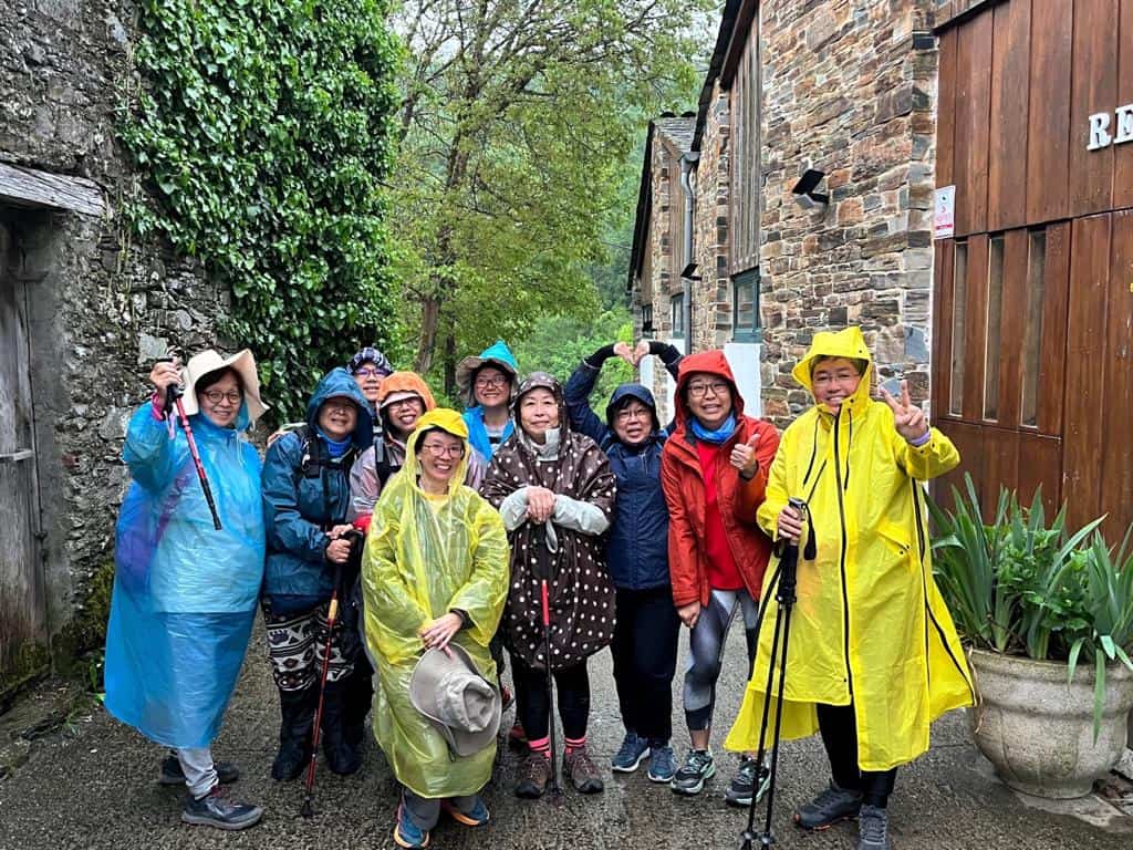 Guided group on camino in ponchos