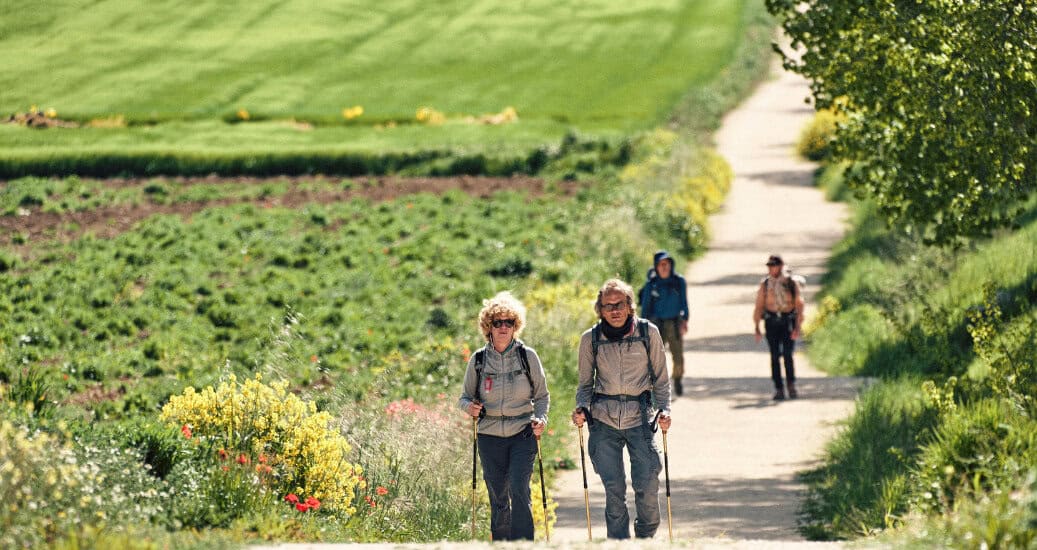 People walking through burgos towards sahagun