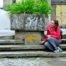 pilgrim and yellow arrow