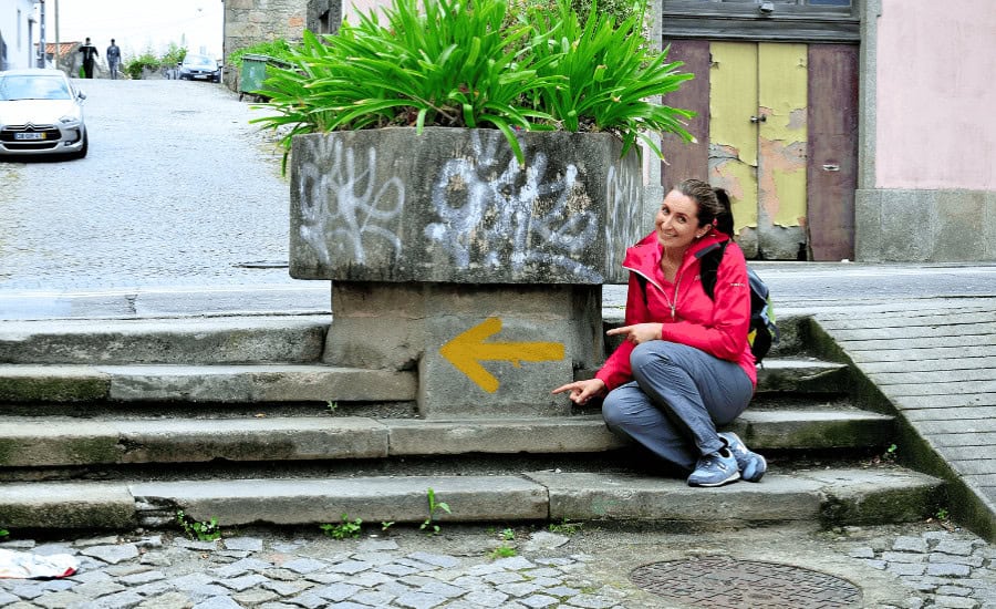 pilgrim and yellow arrow