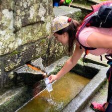 Pilgrim filling bottle from natural fountain