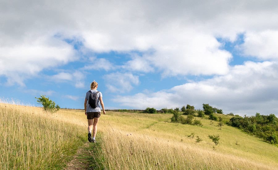 pilgrim on camino path mountains