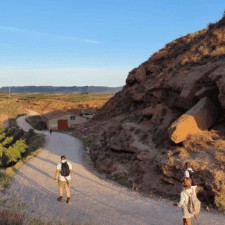 Pilgrims walking through mountains Camino frances