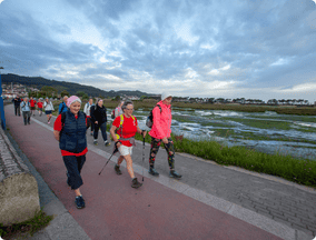 Group walking by the sea - highlight