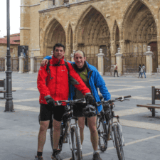 2 pilgrim friends posing on cycle