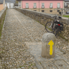 cycle parked by yellow arrow