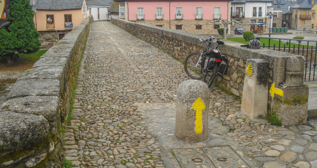 cycle parked by yellow arrow