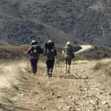 Pilgrims walking through mountains