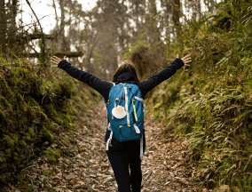 Pilgrim walking on camino frances happy