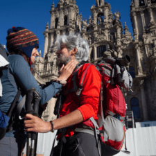 Couple posing by Camino