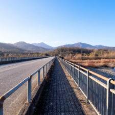 Vanishing Point on Bridge over Magra River in Lunigiana, near Aulla. Winter Landscape. North Tuscany