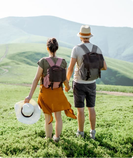 Couple posing on hill