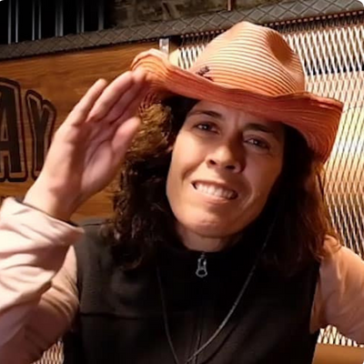 Silvia tour guide wearing hat