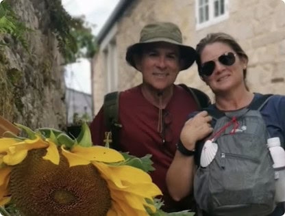 Couple posing by sunflower