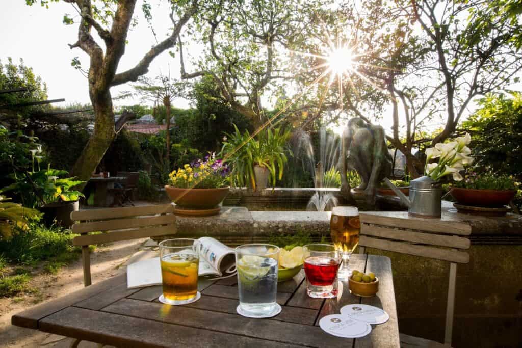 Table laid out with drinks at the Costa Vella Hotel Gardens