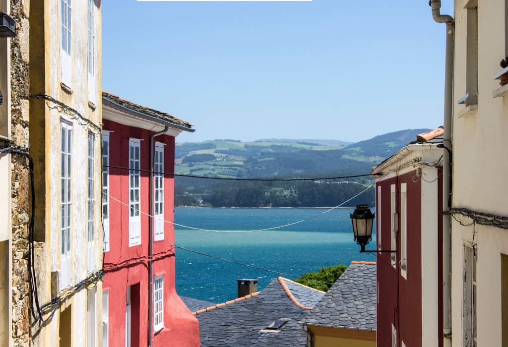 A view over houses down to the river in Ribadeo, Spain